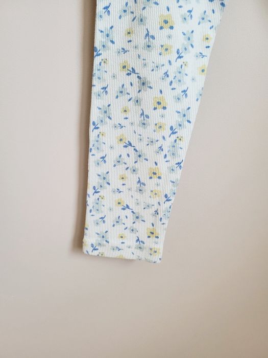 Spodnie 110 legginsy w prążek w kwiaty