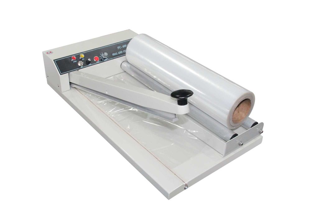 Zgrzewarka impulsowa z odcinaniem i podajnikiem folii SKA-600 (600 mm)- kompletne stanowisko pakujące 3 w 1