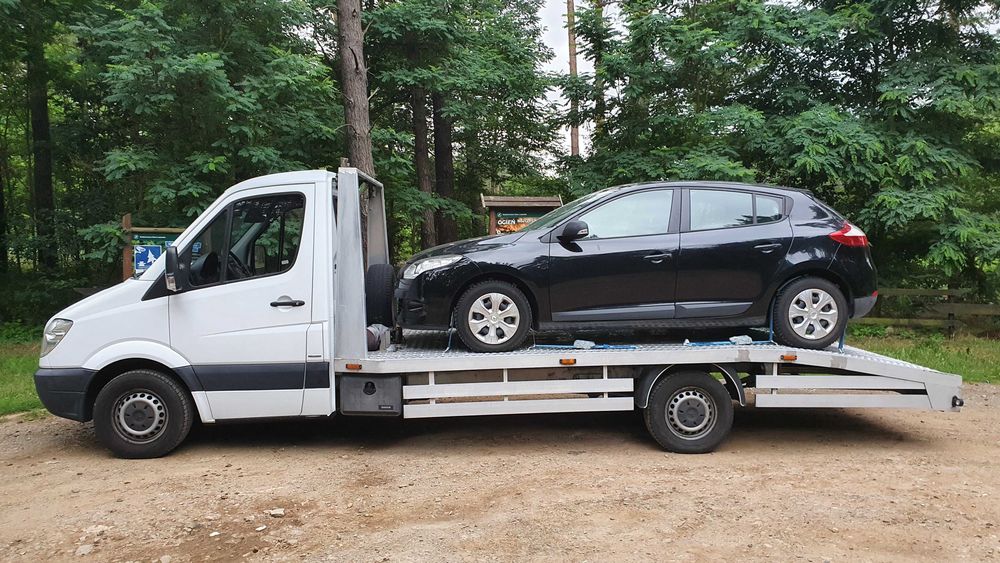 Laweta, parking, pomoc drogowa, assistance, holowanie, odpalanie.Tanio