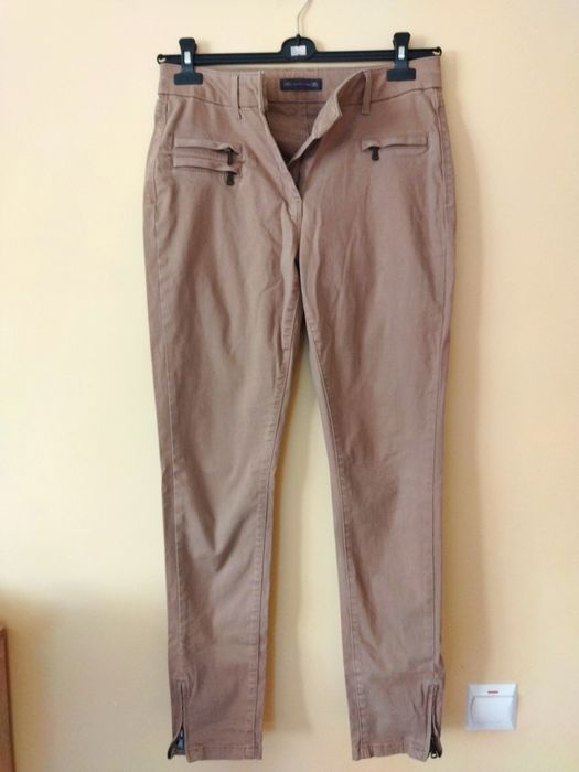 штани з застібками