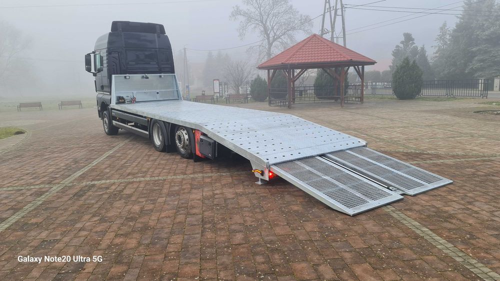 Najazd platforma ciężarowe trzyośka zabudowa laweta MAN TGM Hydraulika