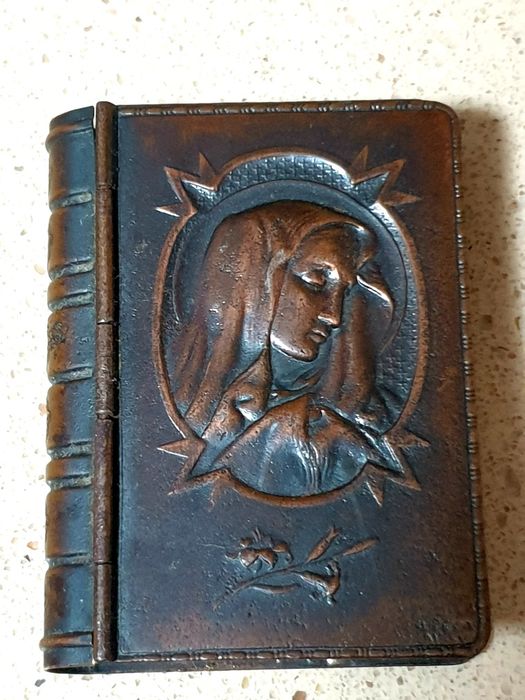 Antique copper rosary box featuring an image of Our Lady