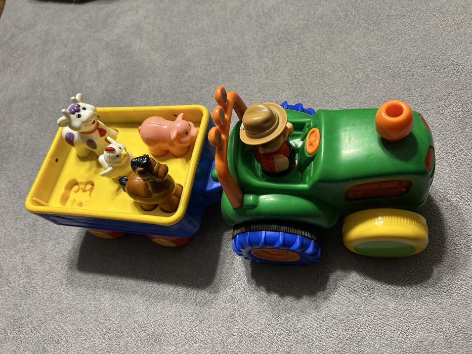 Zabawka edykacyjna Dumel, gra i jeździ, farmer, traktor + 4 figur