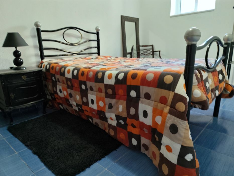 Quarto em Moradia