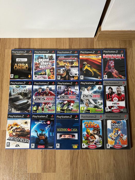 Mega Pack PS2 (Consola+ 3 Comandos+ 15 Jogos+ 2 Microfones+ 32MB Card)