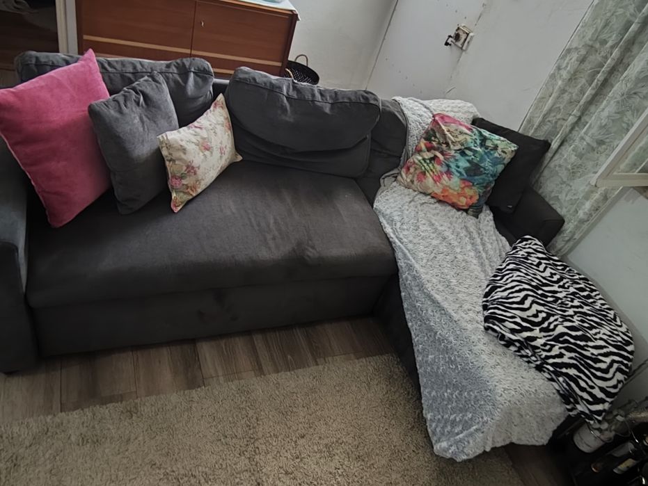 Sofá cinza com chaise lounge