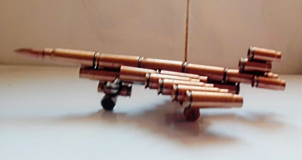 Aviões de Metal (balas) para decoração.