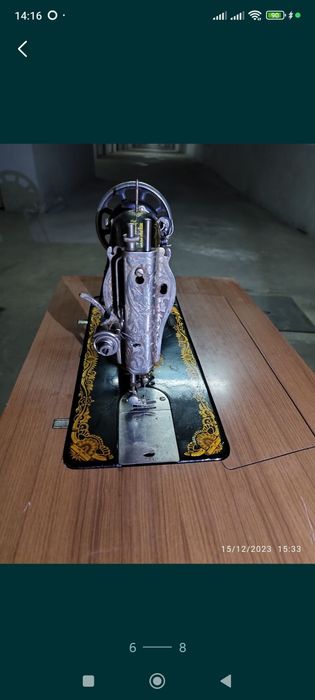 2 Máquinas Singer antigas com 70 anos