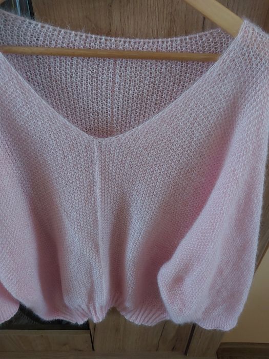 Różowy sweter ryżyk