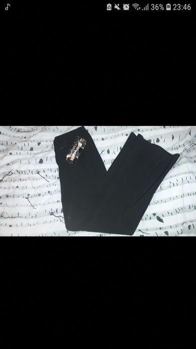 Spodnie garniturowe typu dzwony