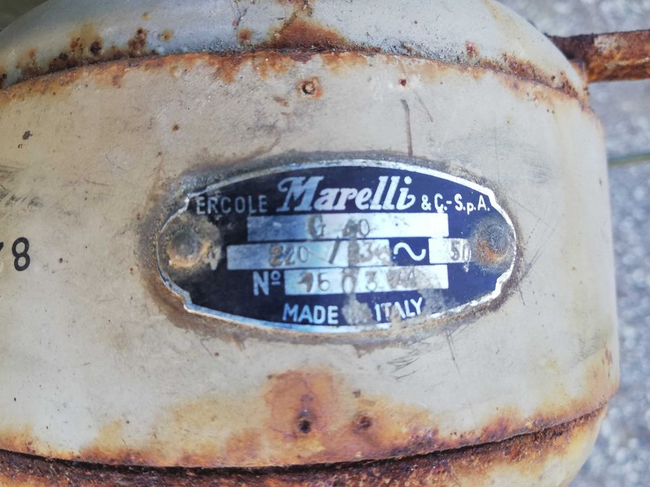 Ventoinha antiga Ercole Marelli de Chão