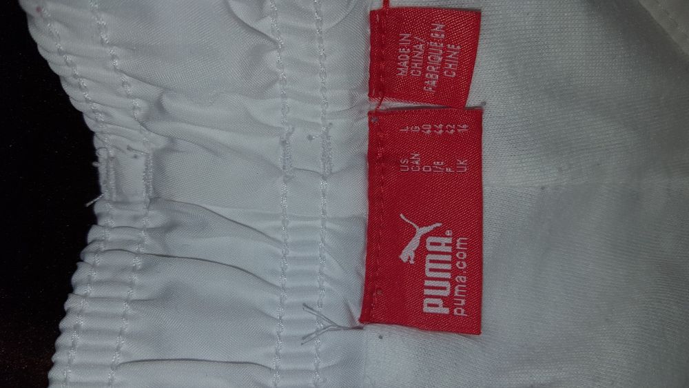Sportowe spodnie firmy PUMA w rozmiarze L /40