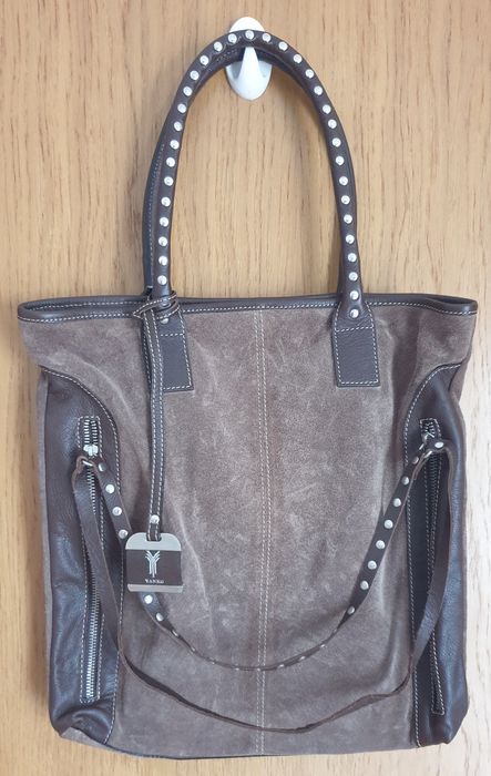 Mala senhora em pele Yanko