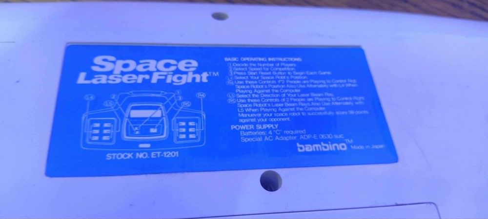 Consola de jogos eletrónicos portátil Bambino Space Laser Fight dos anos 70