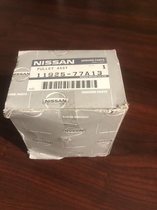1192577A13 Nissan ролик натяжителя приводного ремня