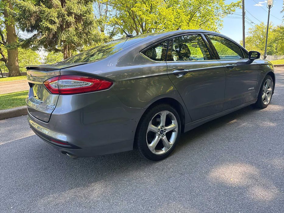 Ford Fusion Titanium Hybrid      2014