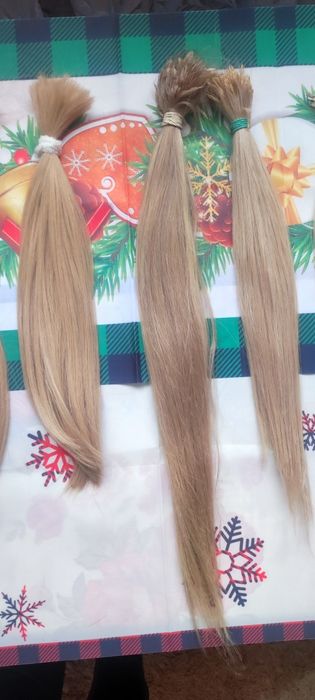 Слов'янське волосся для нарощування та загущення.