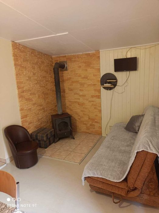 Domek Kretowiny z kozą