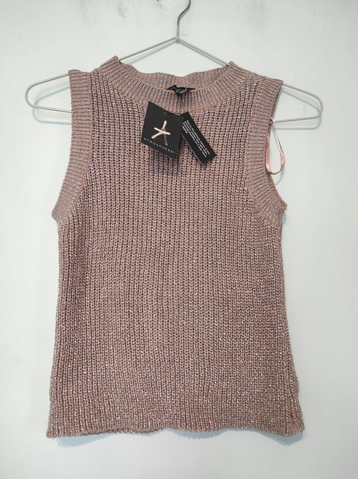 Nowy błyszczący top