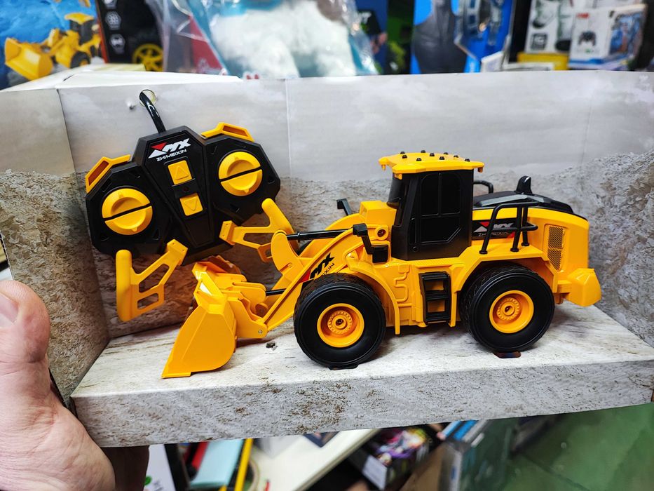 Іграшка трактор бульдозер на радіокеруванні з Німеччини грейдер