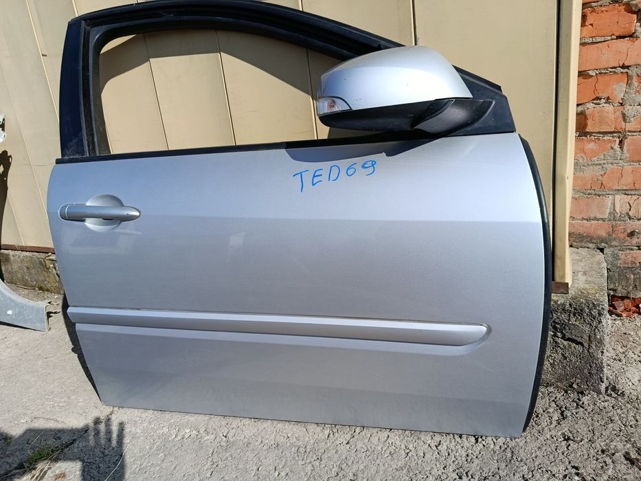 Двері передні праві код фарби TED69. Renault Laguna III (08-15)