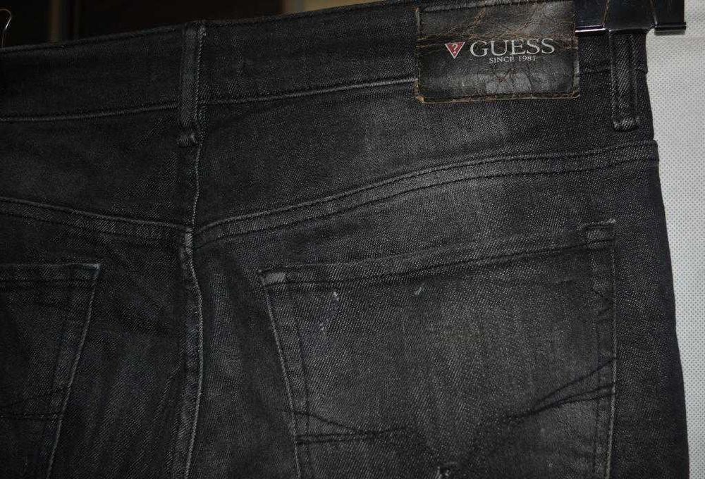 Jeansy z dziurami Guess 32 męskie