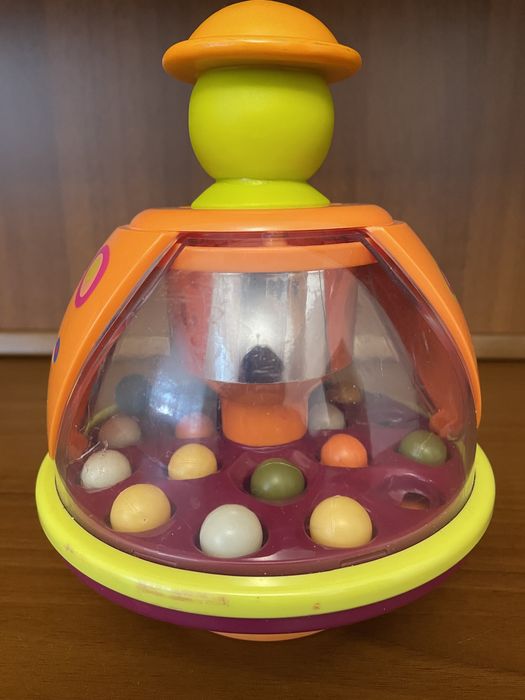 Развивающая игрушка юла