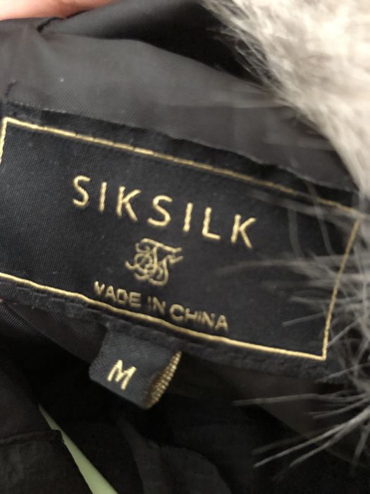Casaco de inverno impermeavel com capucho . Marca Siksilk
