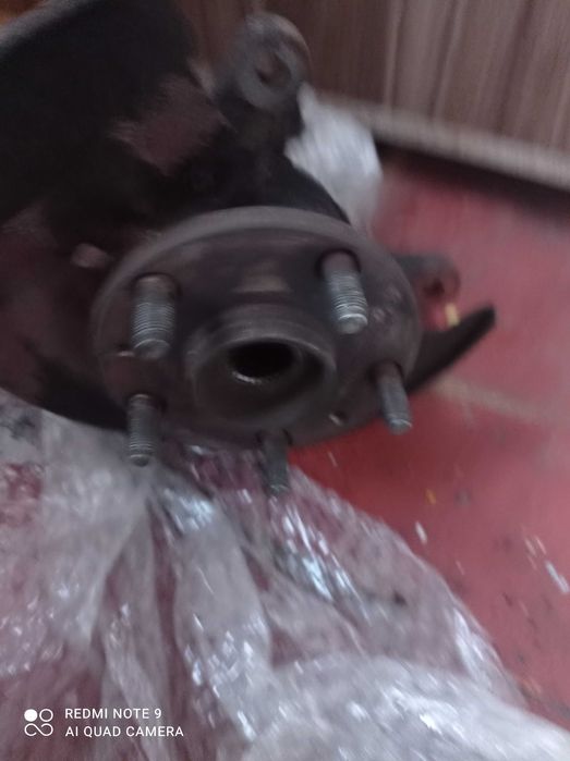 поворотний кулак в збори передній лівий Chery Tiggo T 11 б/у