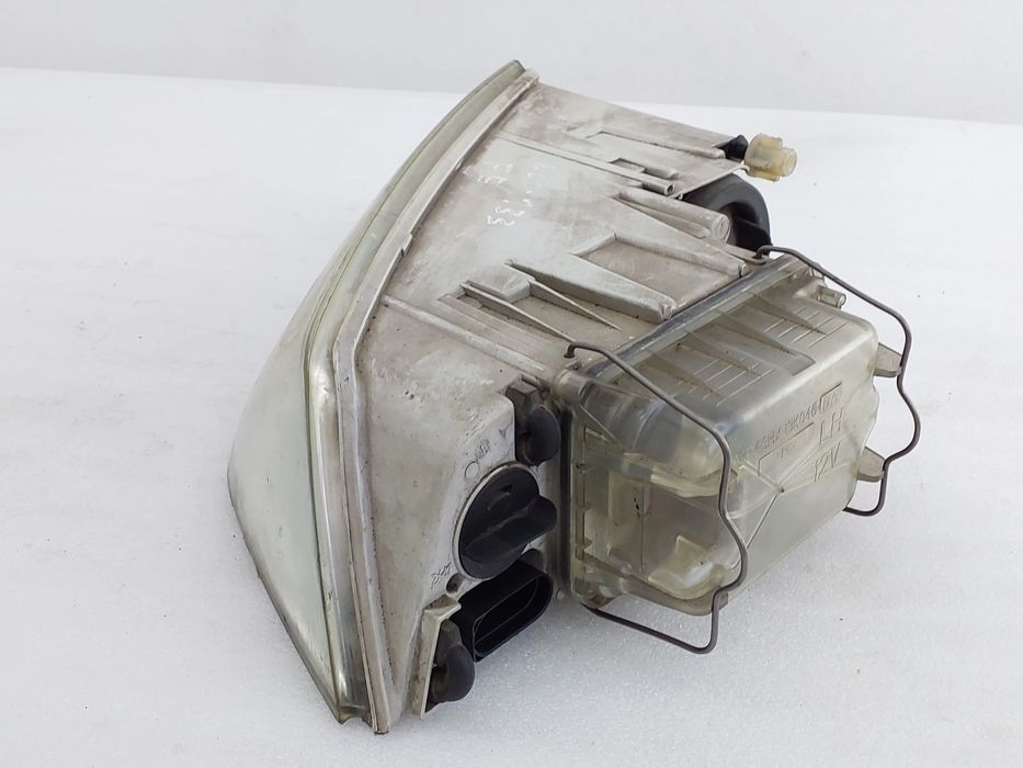 Ótica / farol esquerda SKODA Octavia II Break (1Z5)