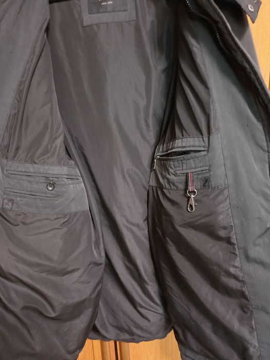 Теплий пуховик з капюшоном