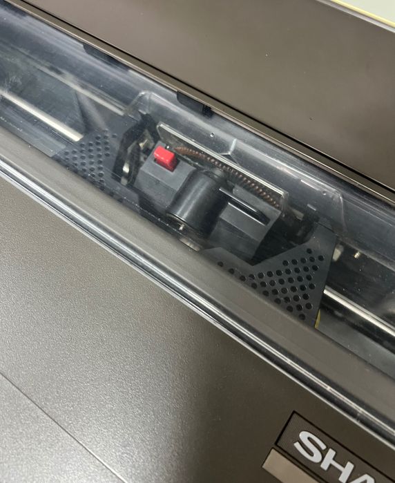 Máquina de escrever Sharp