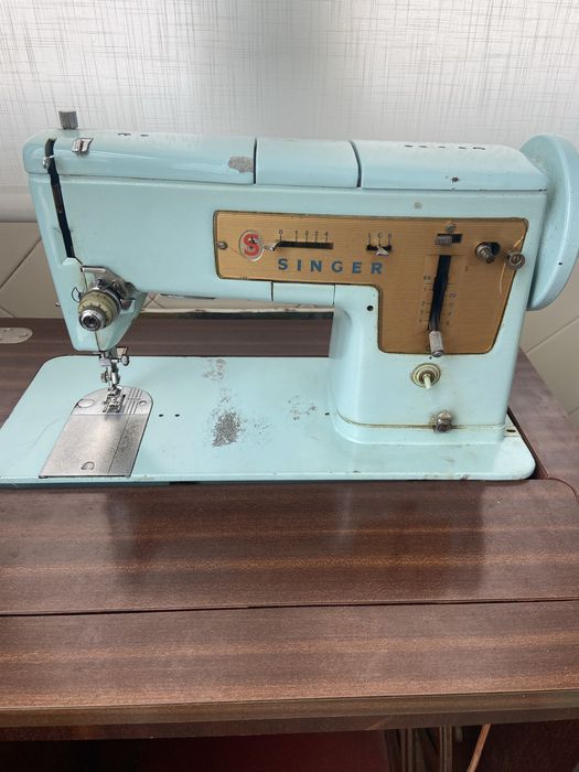 Maquina de costura singer azul