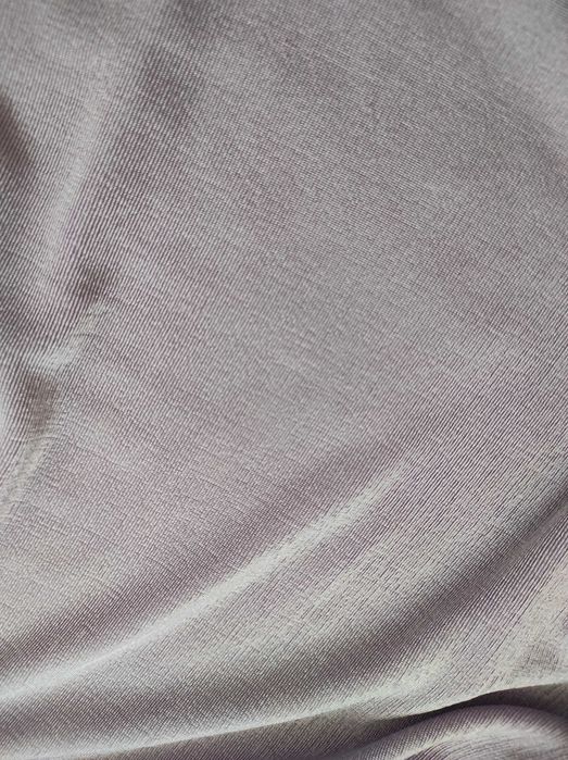 Liliowa bluzka golf body in the style