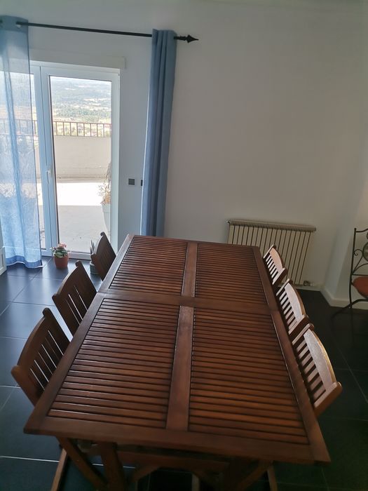 Mesa extensível e 6 cadeiras de exterior