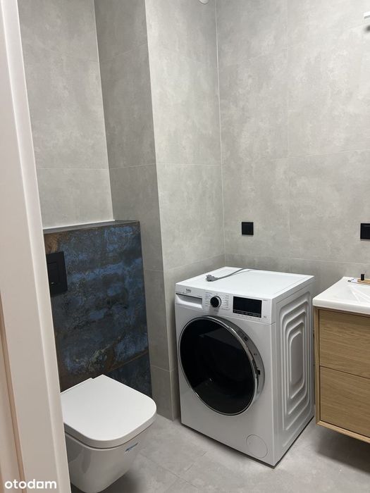 Mieszkanie 59,07m2 . Garaż x 2 rodzinny. Osiedle zamknięte. Dwustronne