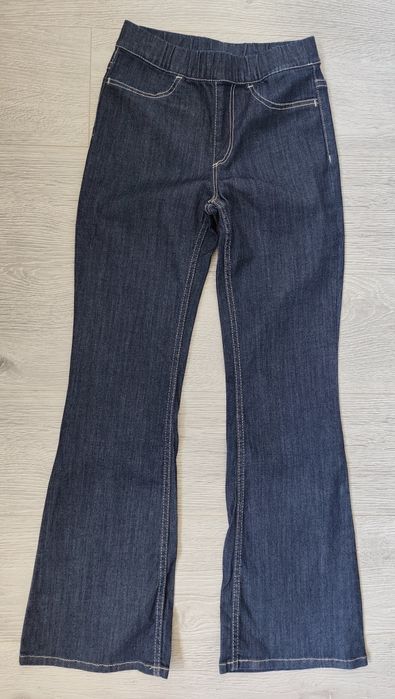 H&M Spodnie dziewczęce jeansowe dzwony 134 flared leg jeansy