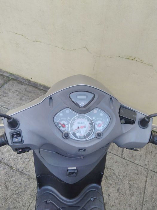 Honda PS 125i impecável.