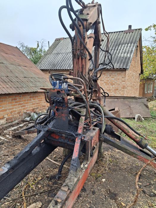 Грейферний погружчик юмз