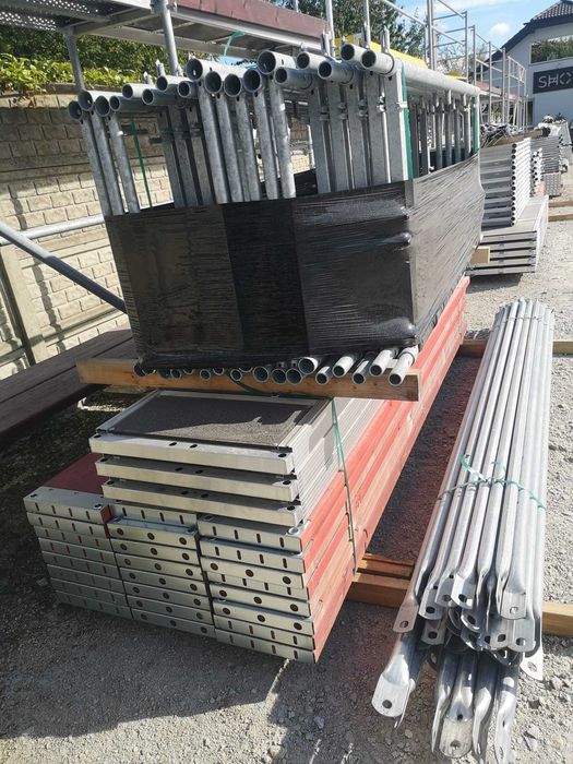 Kompletny zestaw rusztowanie stalowe na ścianę fasadową Plettac 10,4 m x 12 m = 124/125 m2, nowe, na elewację