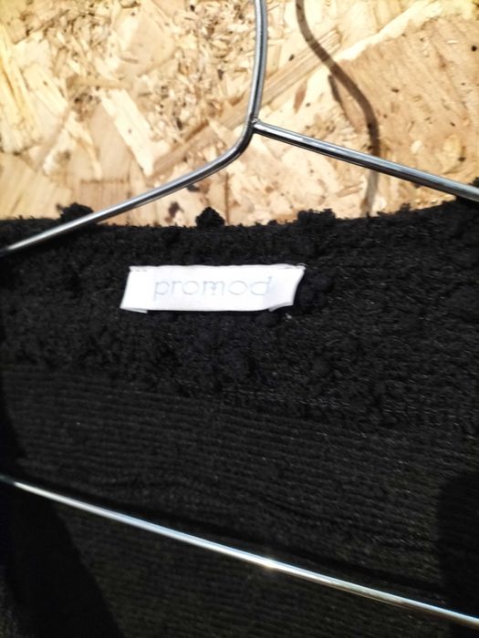 Casaco com fecho preto