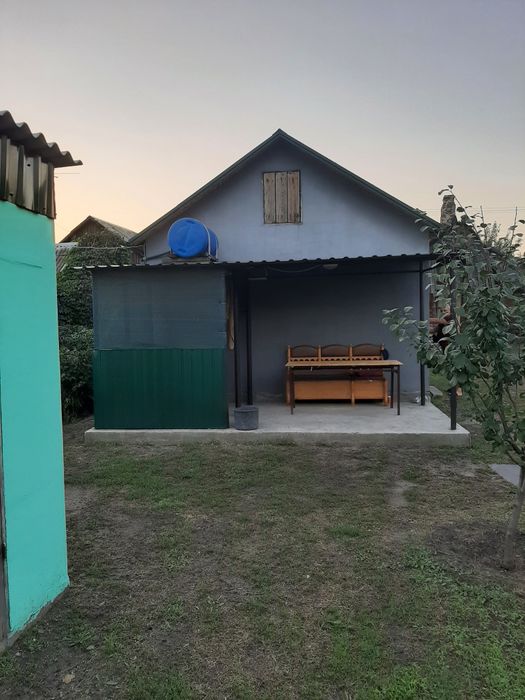 Продам участок с гаражом под застройку