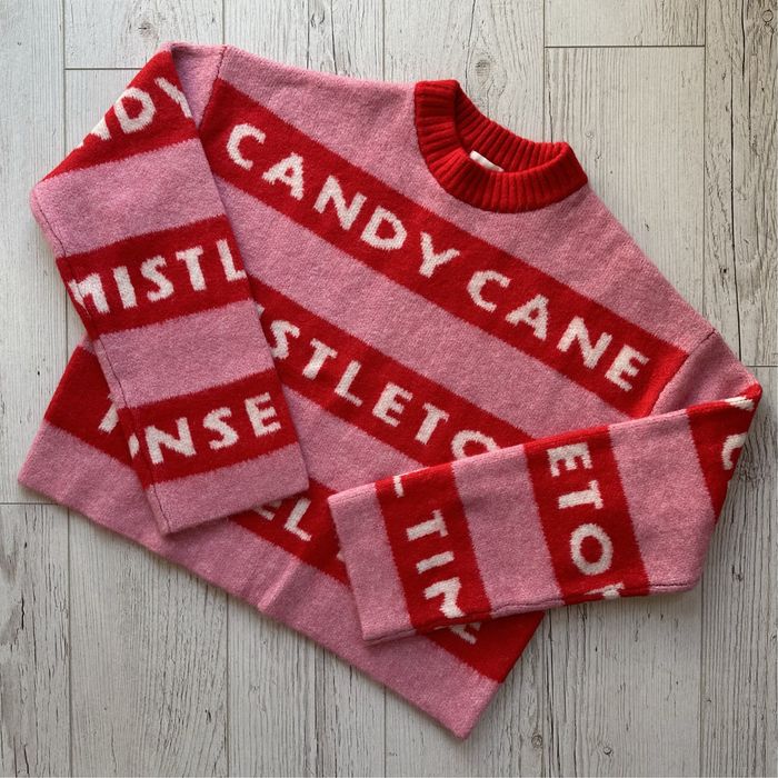 Różowy żakardowy sweter świąteczny oversize h&m candy cane mistletoe