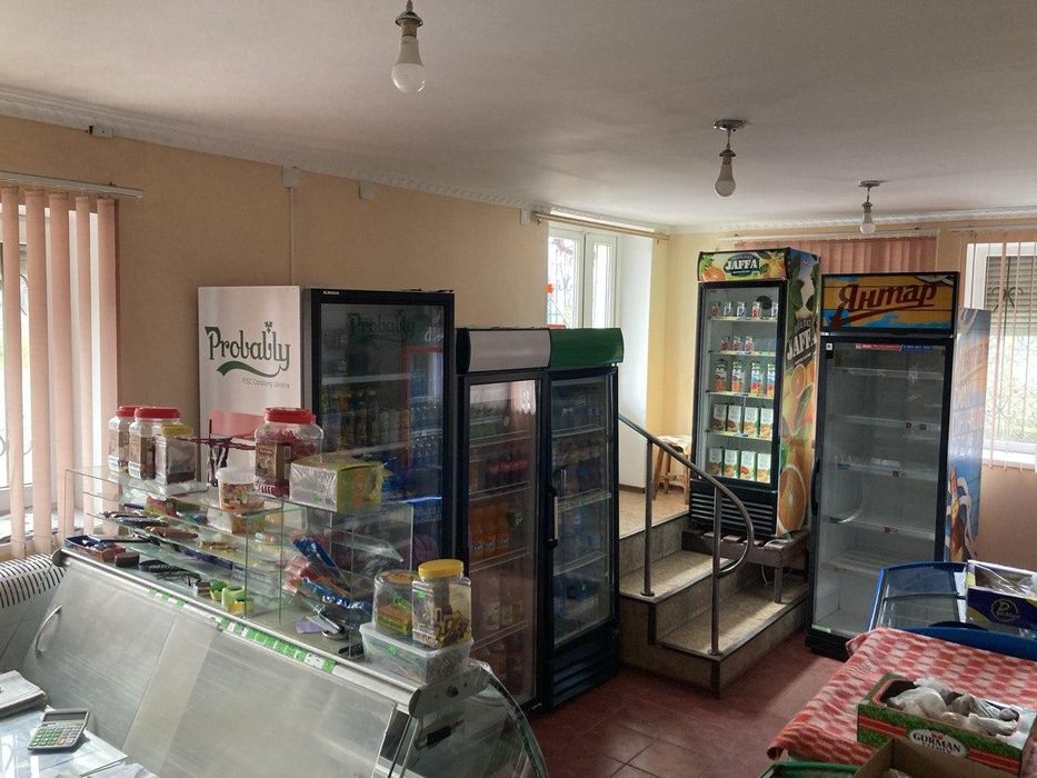 Продам жилой дом с коммерческим помещением.(213-709)