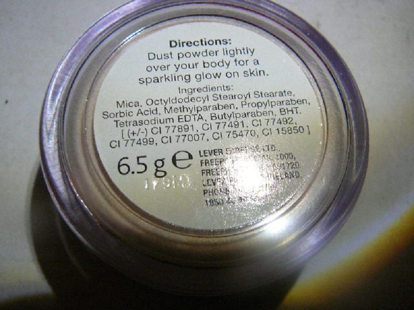 puder rozświetlający Impulse Body Shimmer ,szminka Rimmel +kosmetyczka