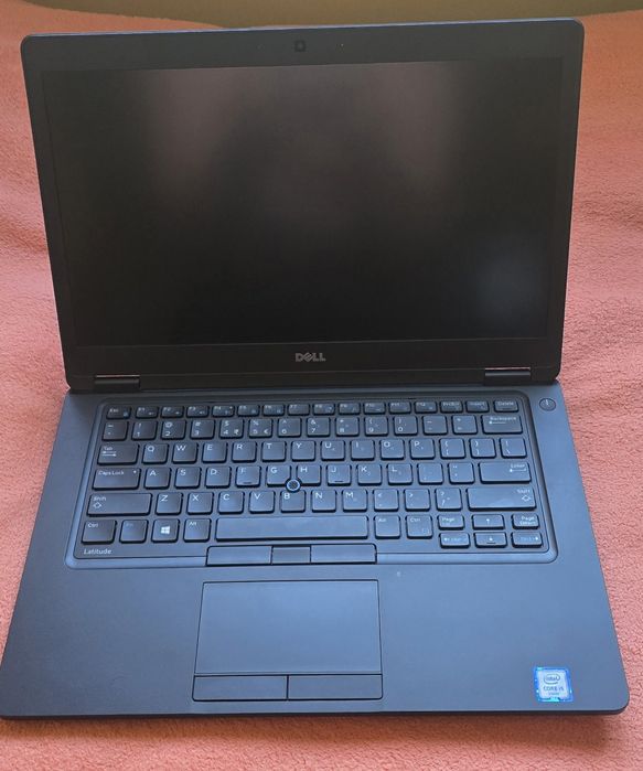 Notebook DELL LATITUDE 5480 , torba skórzana Targus, dwa zasilacze oraz stacja dokująca DELL
