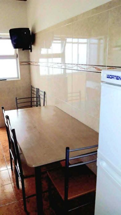 T2 mobilado e equipado com marquise e dispensa em Olhão