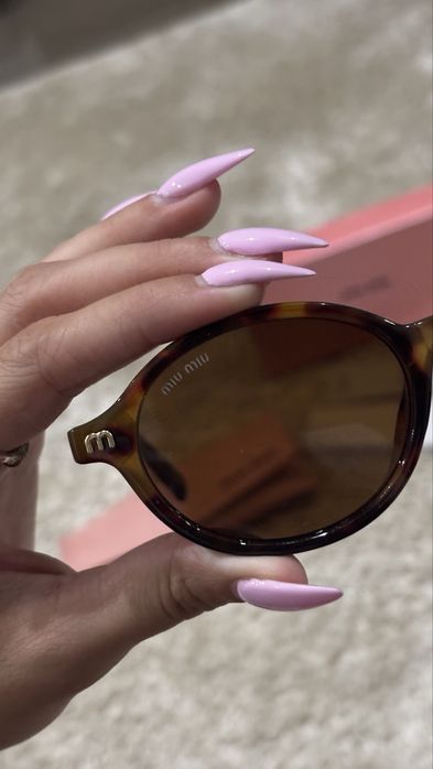 Oculos de sol da MiuMiu