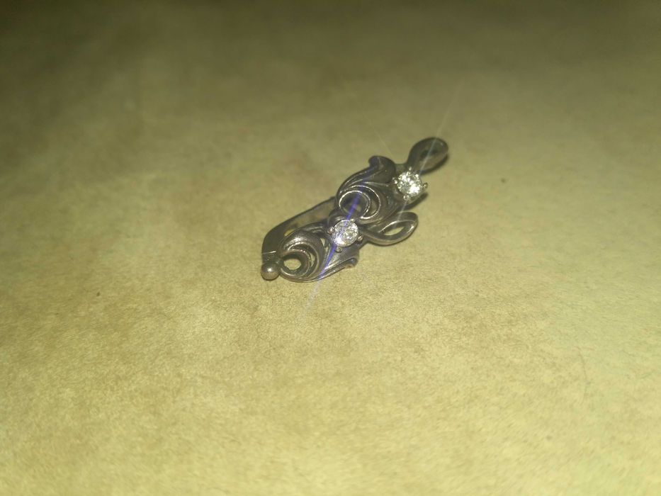 Серьги серебряные с цирконием в форме скрипичного ключа