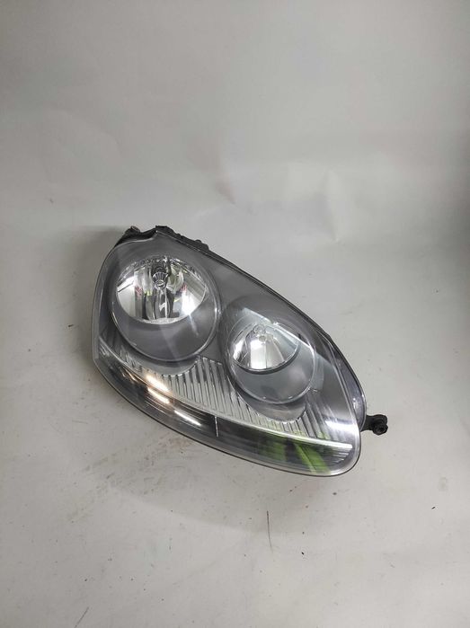 Vw Golf V,OE:1K694.1006C, Lampa przednia prawa, Oryginał HELLA, Europa